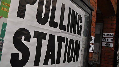 A sign indicating a polling station