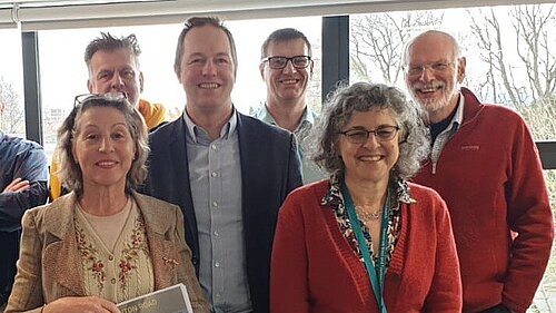 Richard Foord standing with members of the Cullompton Railway Station Metro Board